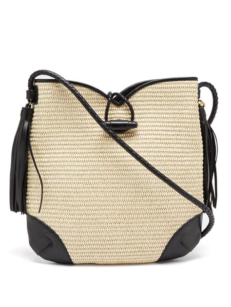 raffia bag with black trim.